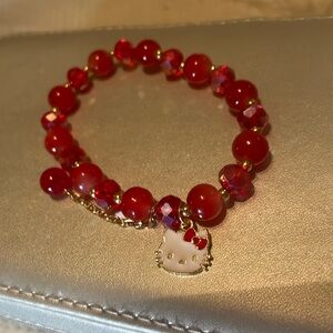 Hello Kitty beaded bracelet - pretty reddish pink beads - NWOT